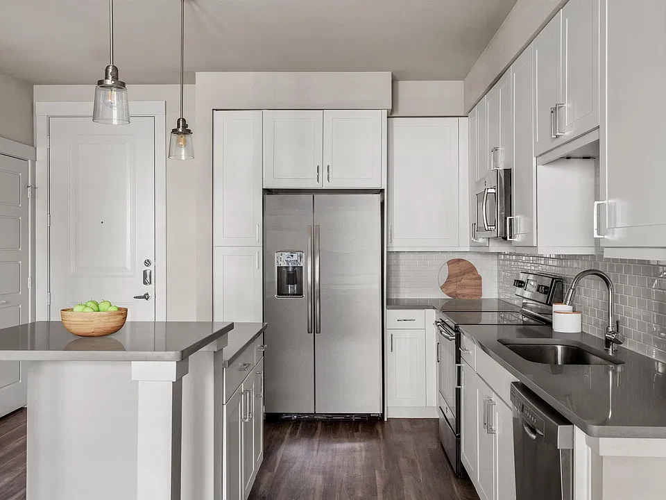 A kitchen island doubles the counter for prep, plating and cleanup.