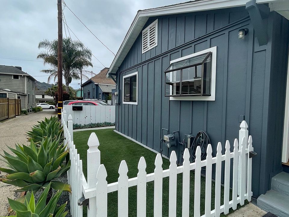 Fenced in yard with turf