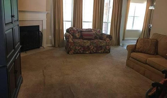 Living room w/ fireplace