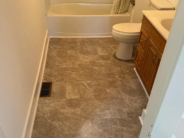 New floor installed in both bathrooms