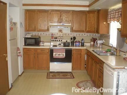 Kitchen
						:
						Older kitchen, but well maintained. Comes with all appliances.