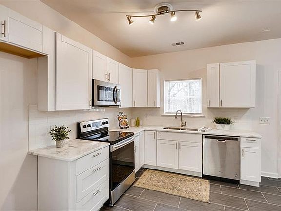 Kitchen, Refrigerator is included.