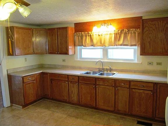 Kitchen with oak cabinets