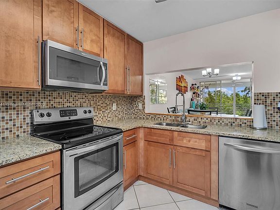 5th image of 9510 Seagrape Dr APT 304