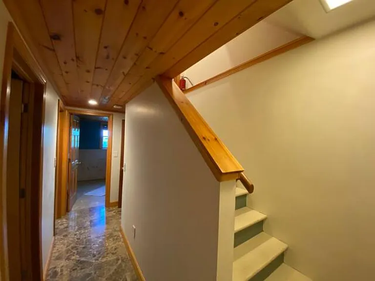 Stair/ Hall to Bedroom #3, Bathroom, #2, laundry and Family Room