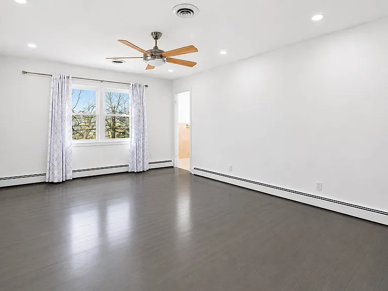 Primary bedroom, virtually enhanced