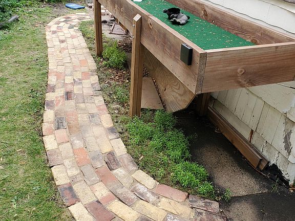 Carpet ball table, and walking path installed in 2023.