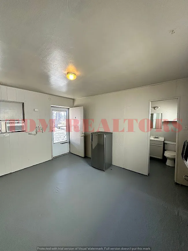 Building Photo - 7134 N Dort Hwy #3