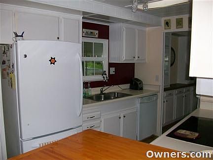 Kitchen with refrig, DW, disposal.