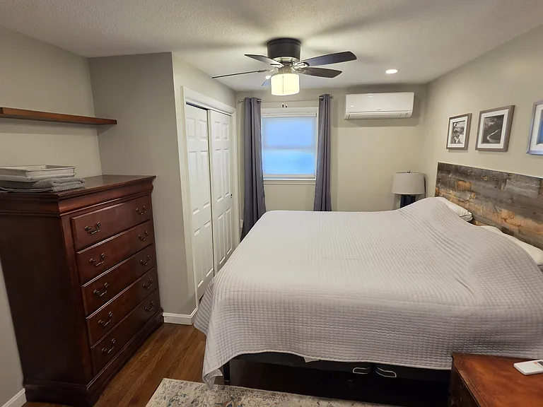 Master Bedroom with king bed, mini split and ensuite bathroom/shower.