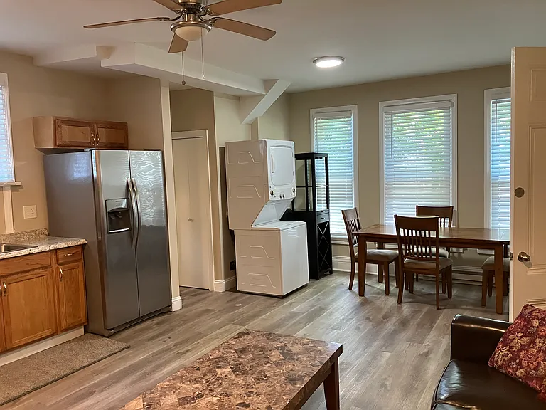 Large living and dining area with laundry.