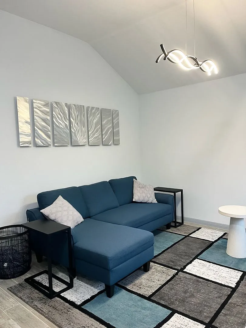 Gated Community Gem with Art Deco Touches & Year-Round Sunroom — Photo 4