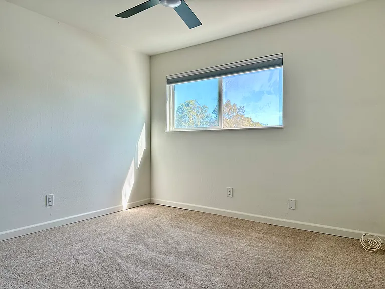 2nd bedroom with new carpet!