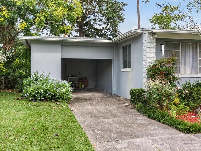 Open Garage with locked storage areas