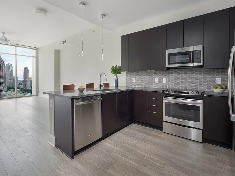 Open floorplan living rooms with Kember wood-style floors