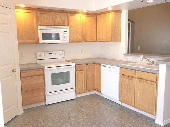 Great cabinetry, counter space and walk in pantry