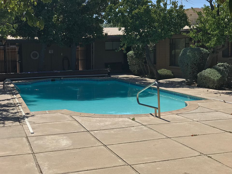 The community pool is well-maintained and shared by only 12 units.