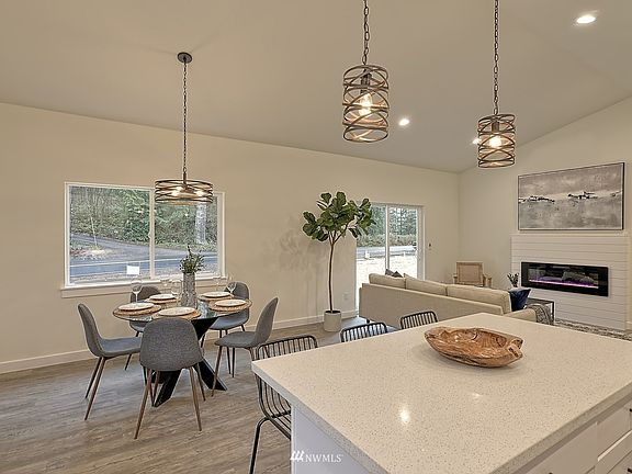 Kitchen eating space.  Photo is of similar home for reference only.