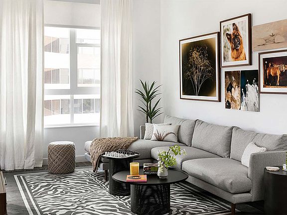 Apartment Living Room with Hard Wood Flooring.