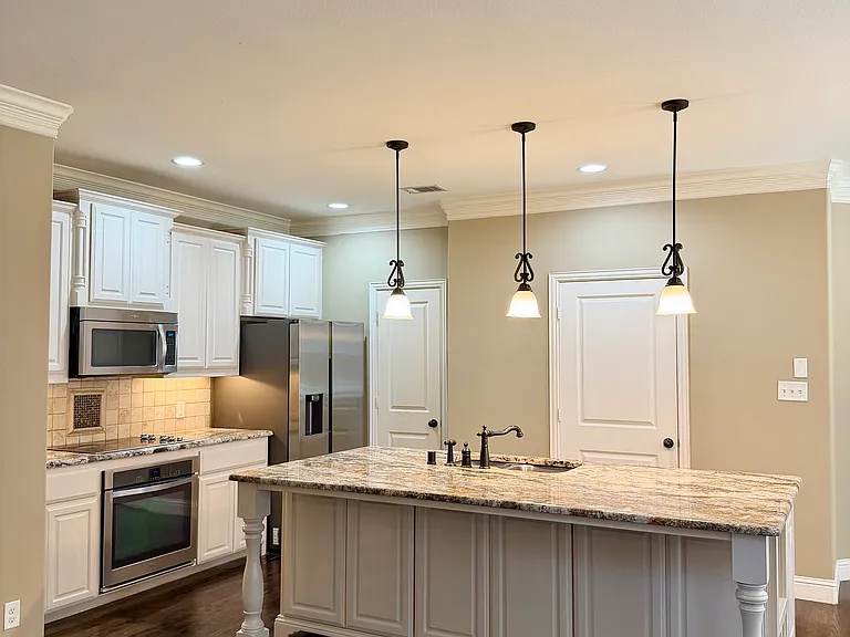 Kitchen with refrigerator included