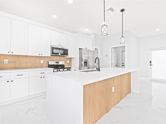 2nd image of 311 Mangonia Ave