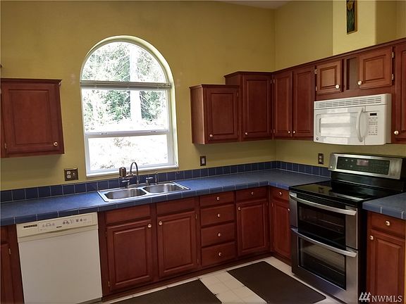 Chef's dream kitchen.  Plenty of natural light, counter space and cabinets.