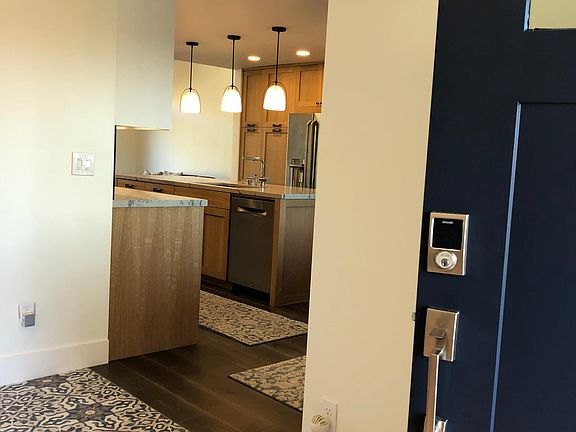 Front entrance, foyer and kitchen