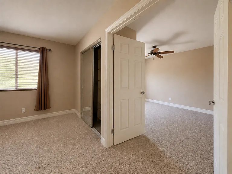Primary suite includes double door entrance to retreat