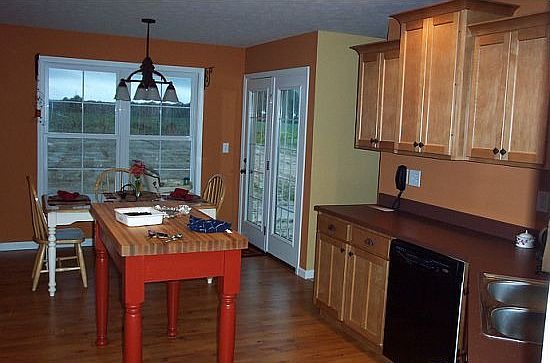 Eat in kitchen. Featuring Haas maple cabinets, pantry