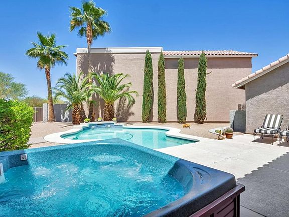 Jacuzzi and pool in courtyard