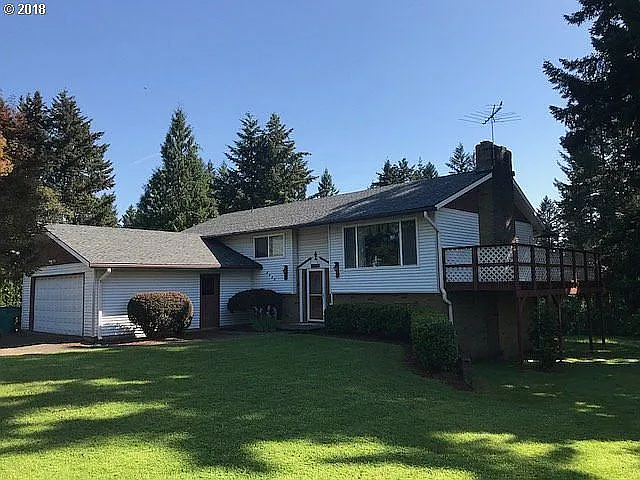 2101 NE Village Green Dr photo 1