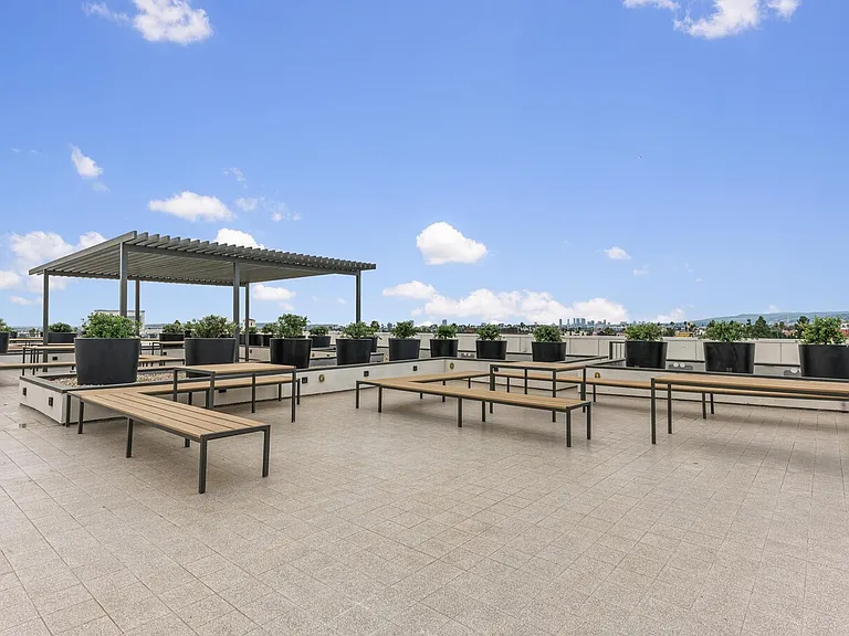 Rooftop with Large Sitting Areas and BBQ