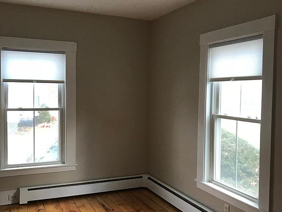 Living Room features original 1895 pine flooring
