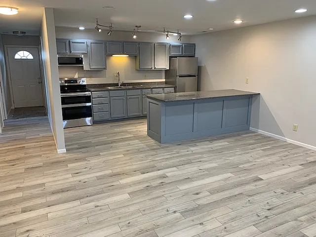 Living/ Kitchen Area with bar seating