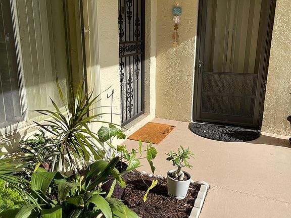 Porch entrance (can close accordion shutter for privacy).