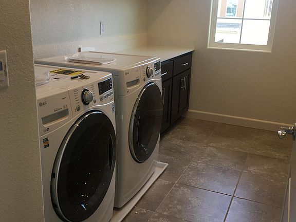 Laundry room, with cabinets and folding area