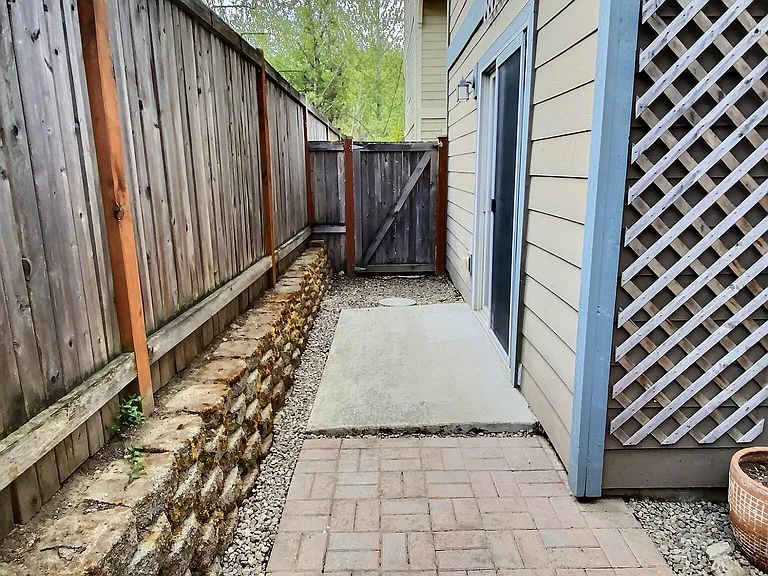 Enjoy a sunny, fenced in, private patio that's perfect for container gardening, outdoor dining, grilling, or relaxing with your morning coffee.