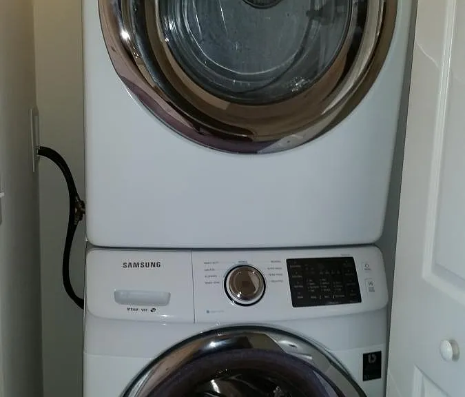 High Efficiency Washer and Dryer located just outside the be