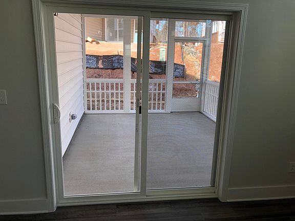 Enjoy this quiet screened in patio