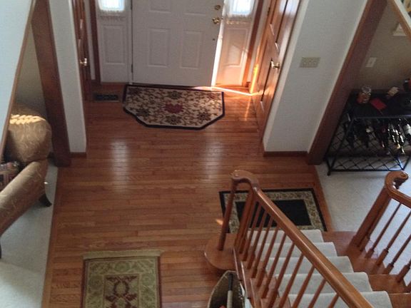 Entry with wood flooring