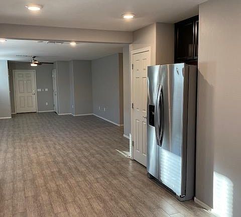 view from kitchen into grand room