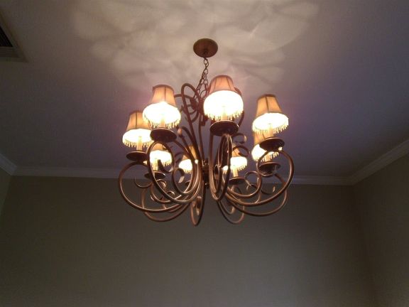 Huge chandelier in dining boasts for elegant entertaining!