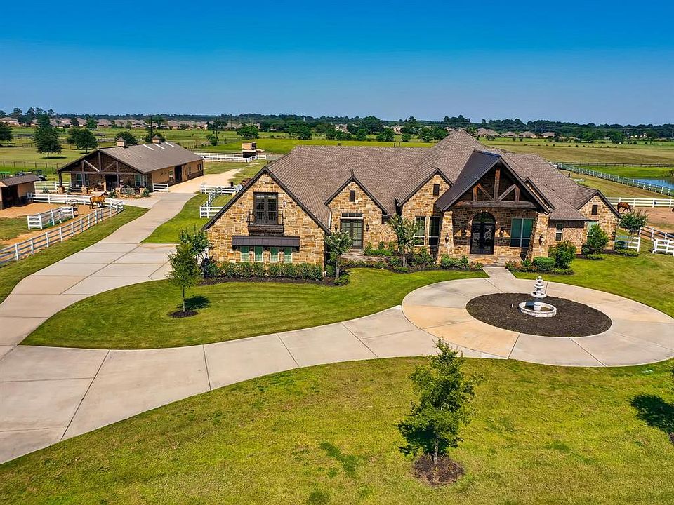 Custom home and Murphy house on 10 acres in the Gated Community of Hunters Creek Estates in Hockley, Texas.