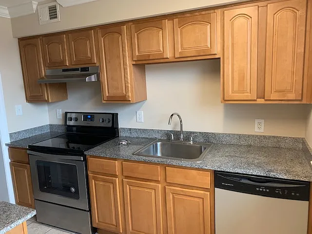 Honey glazed maple cabinets.