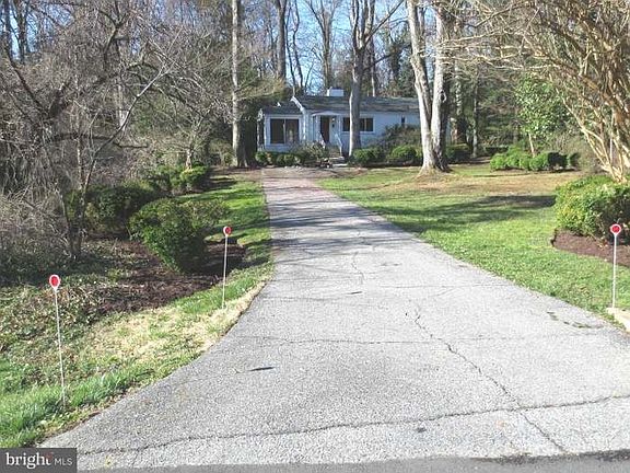 Set back off the road; view from end of the driveway
