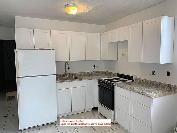 Kitchen during remodel, microwave above stove added, not shown here