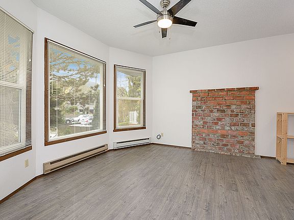 Living area with front bay windows