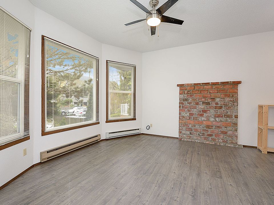 Living area with front bay windows