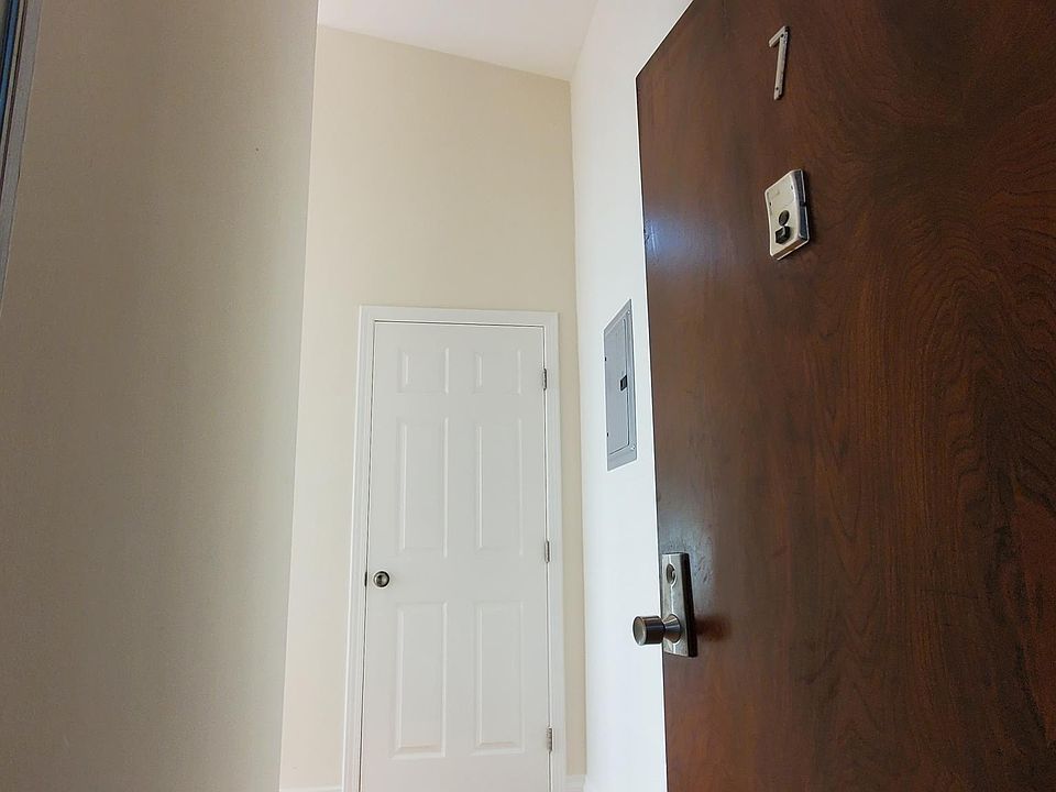 2. Welcome Home 
* Coat/Storage Closet
* Blue Hand Blown Hanging Entry Light 
* Classic Ringer Doorbell