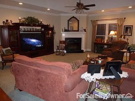 Large den with recessed ceiling.